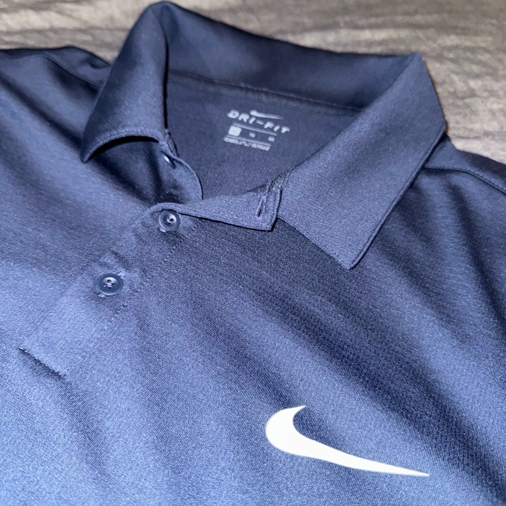 Navy blue Nike golf athletic polo shirt